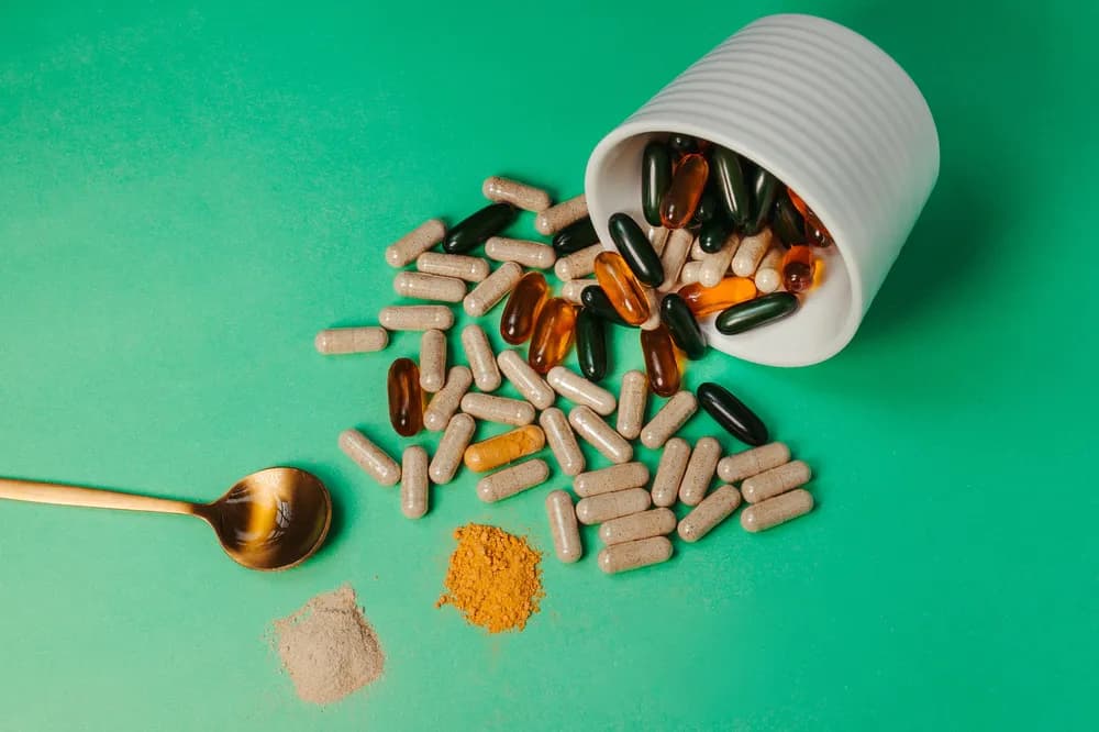 Natural supplement powder and ingredients in a bowl