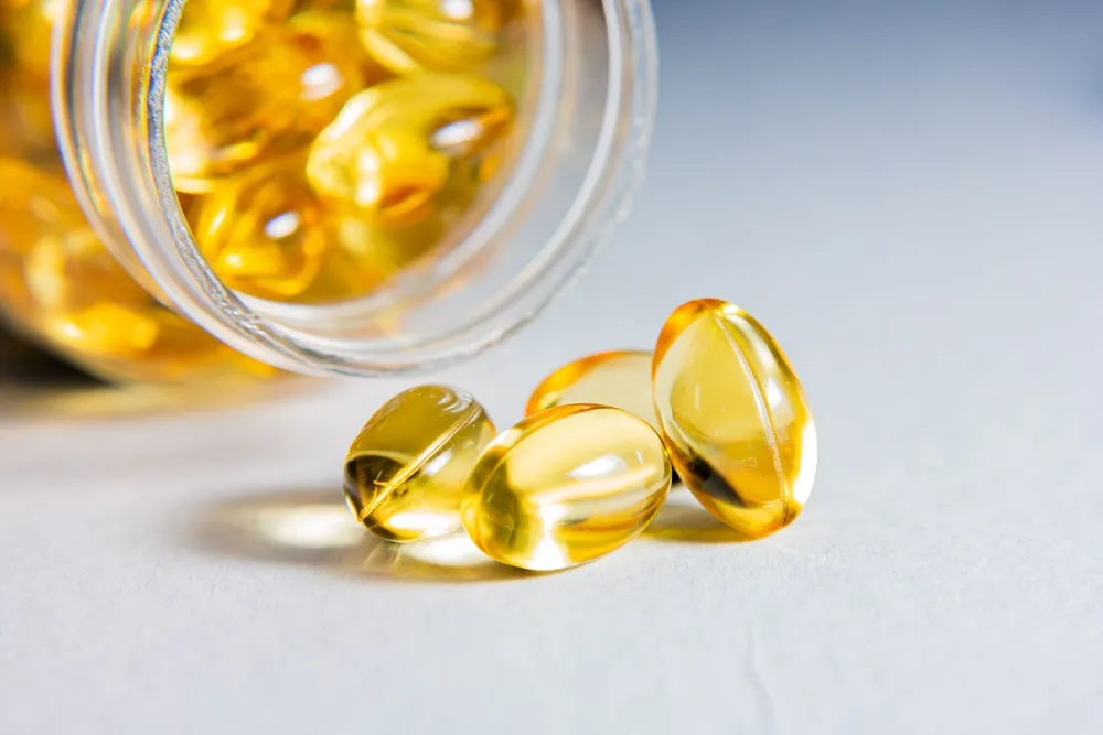 Macro view of vitamin capsules and supplement actives